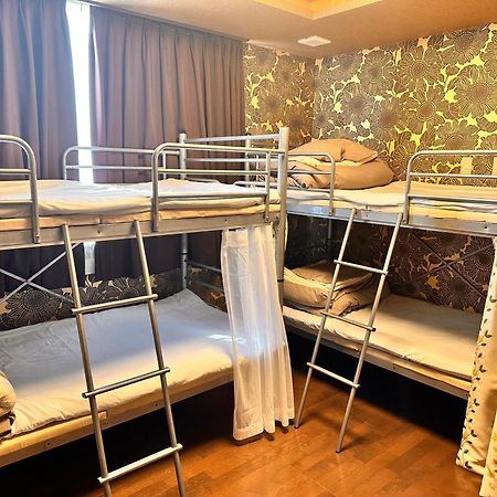 Guesthouse Tiga Kumamoto Bagian luar foto