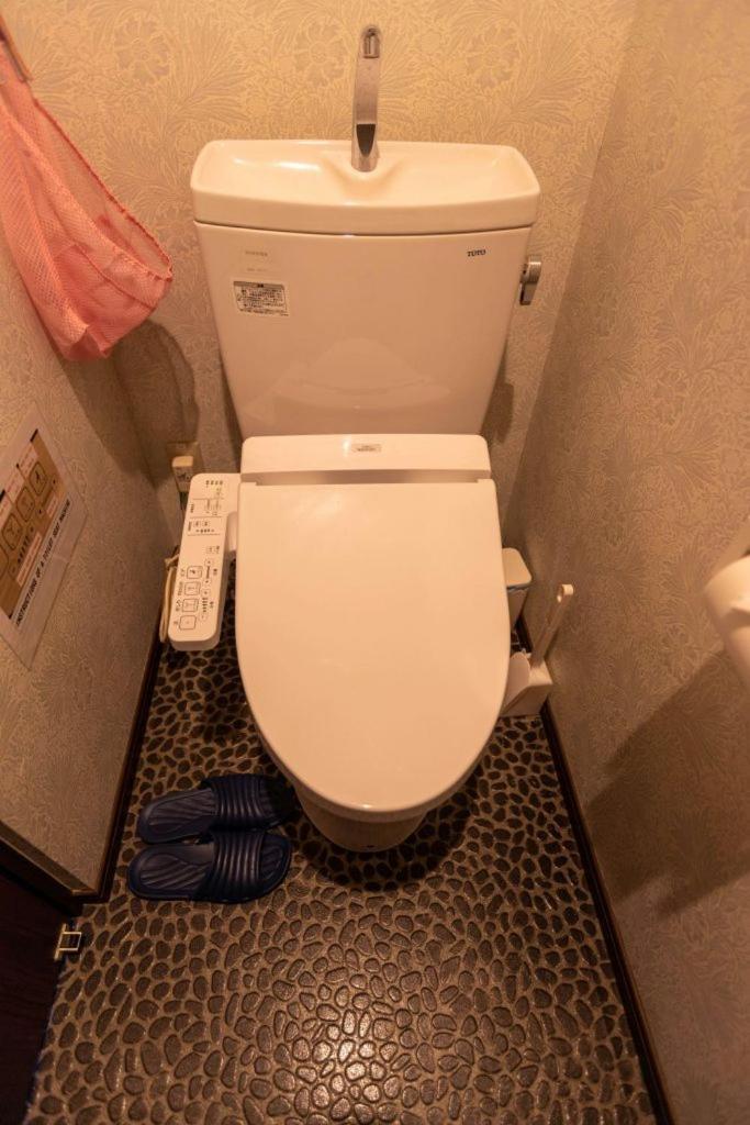 Guesthouse Tiga Kumamoto Bagian luar foto