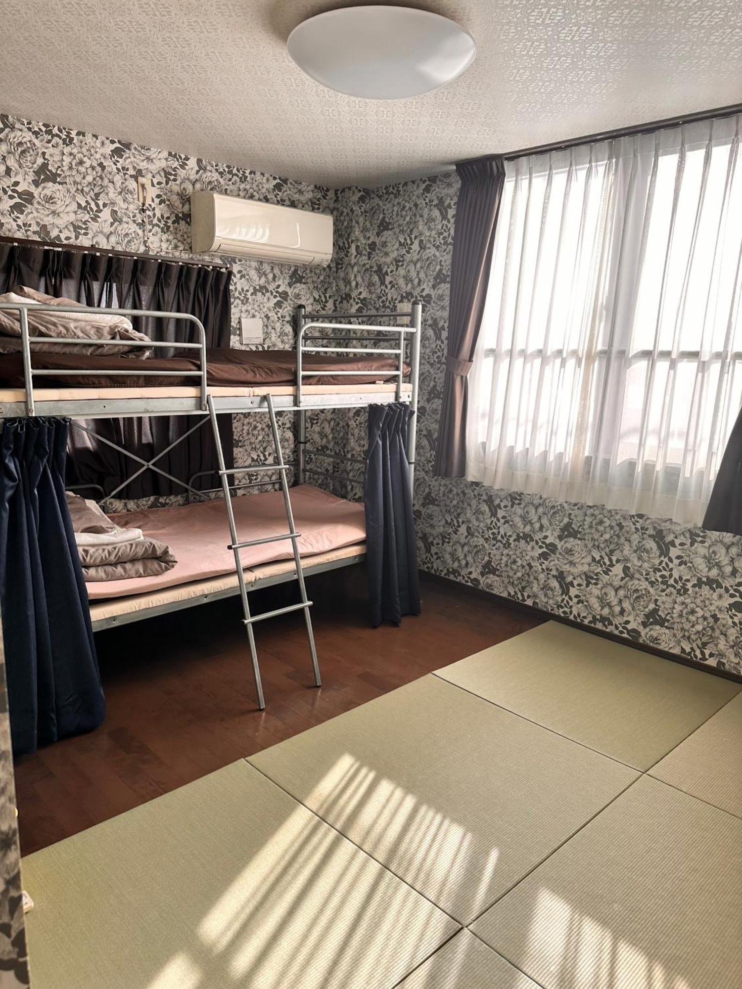 Guesthouse Tiga Kumamoto Bagian luar foto