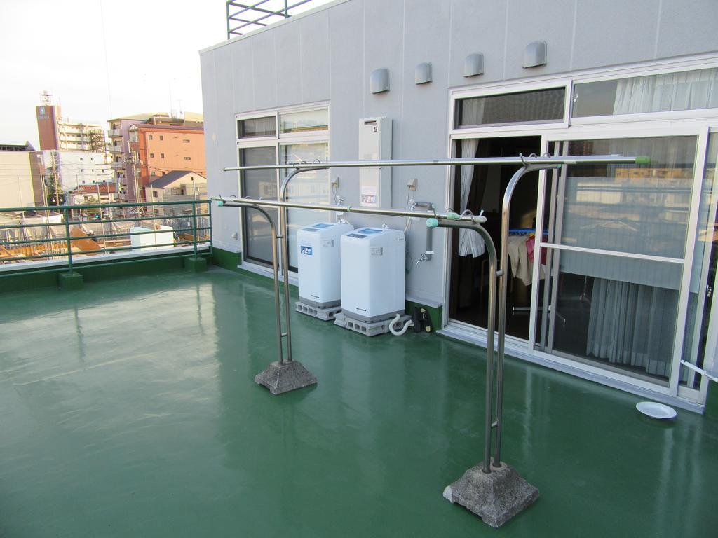 Guesthouse Tiga Kumamoto Ruang foto