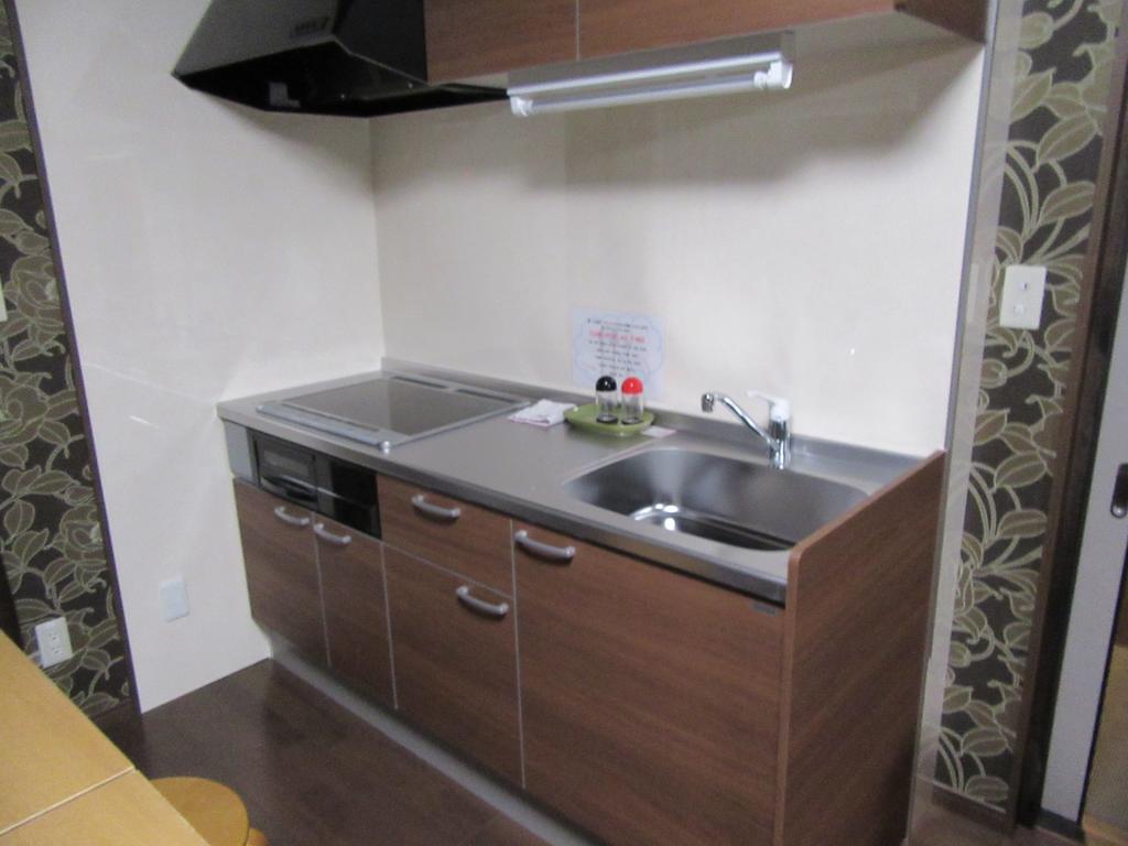 Guesthouse Tiga Kumamoto Ruang foto