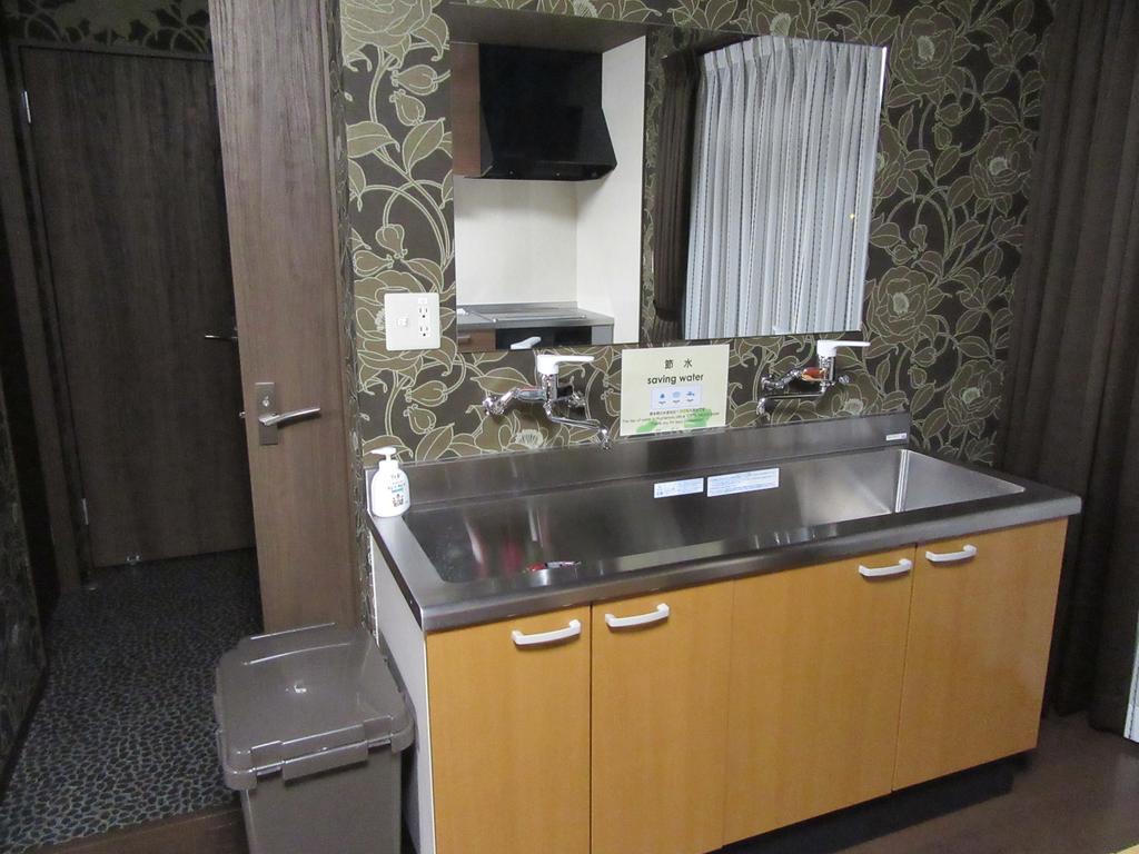 Guesthouse Tiga Kumamoto Bagian luar foto