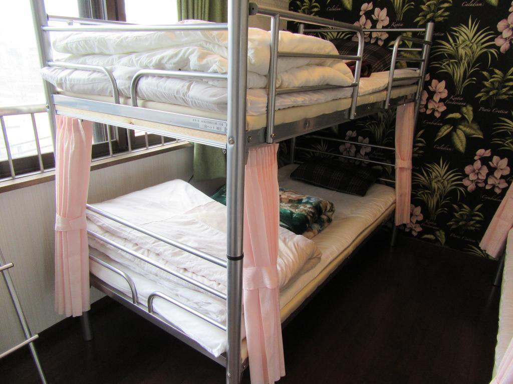 Guesthouse Tiga Kumamoto Bagian luar foto