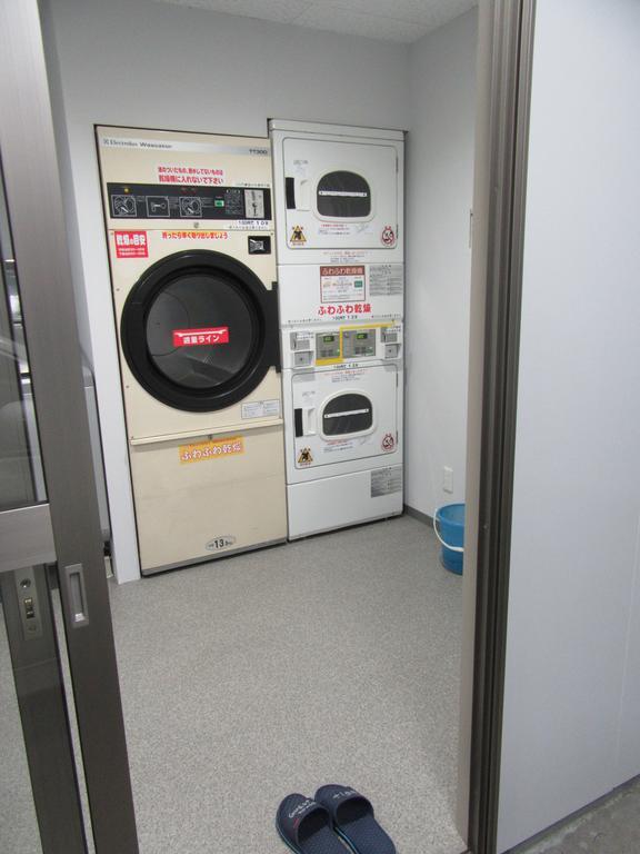 Guesthouse Tiga Kumamoto Bagian luar foto