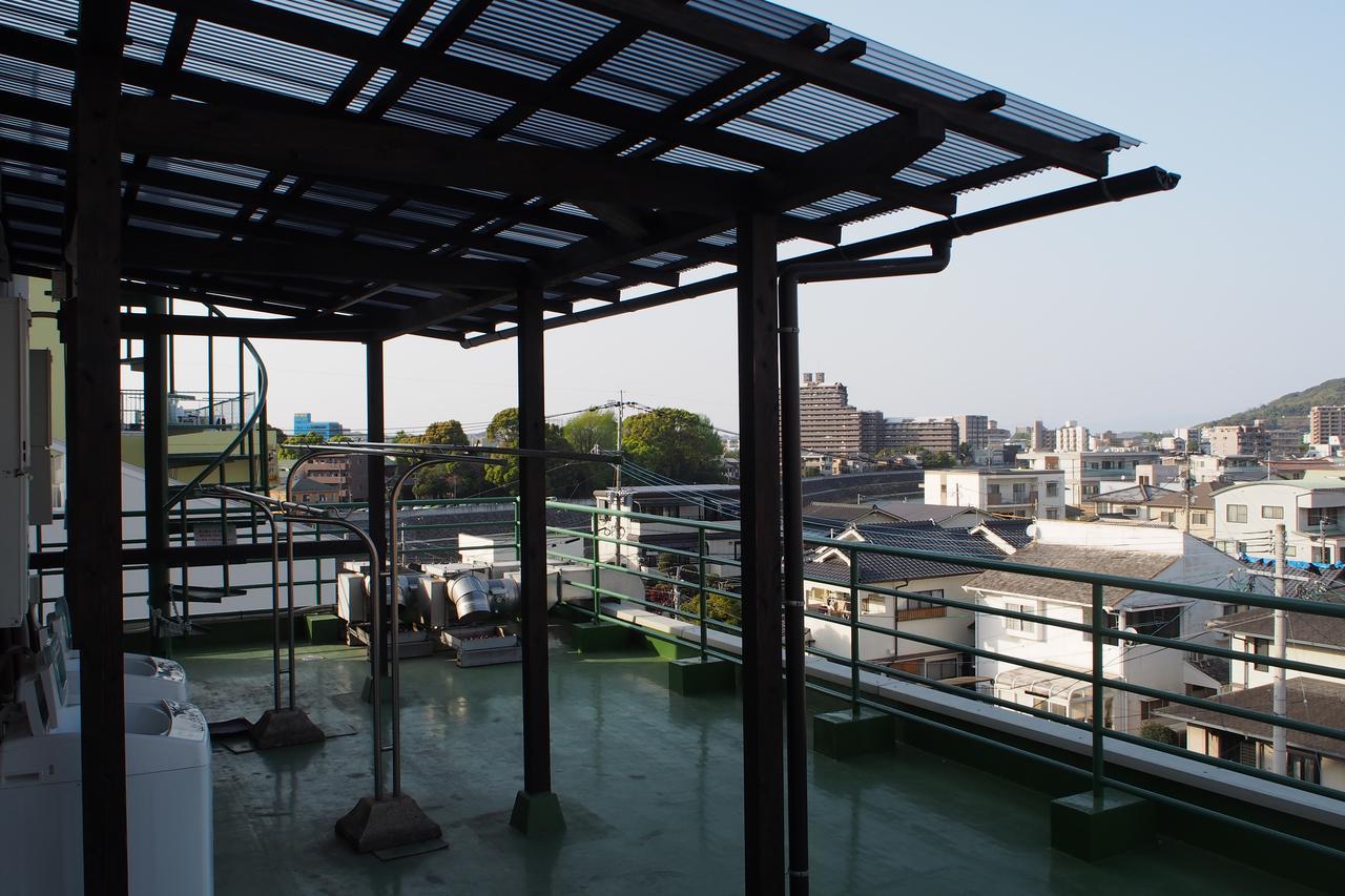 Guesthouse Tiga Kumamoto Bagian luar foto