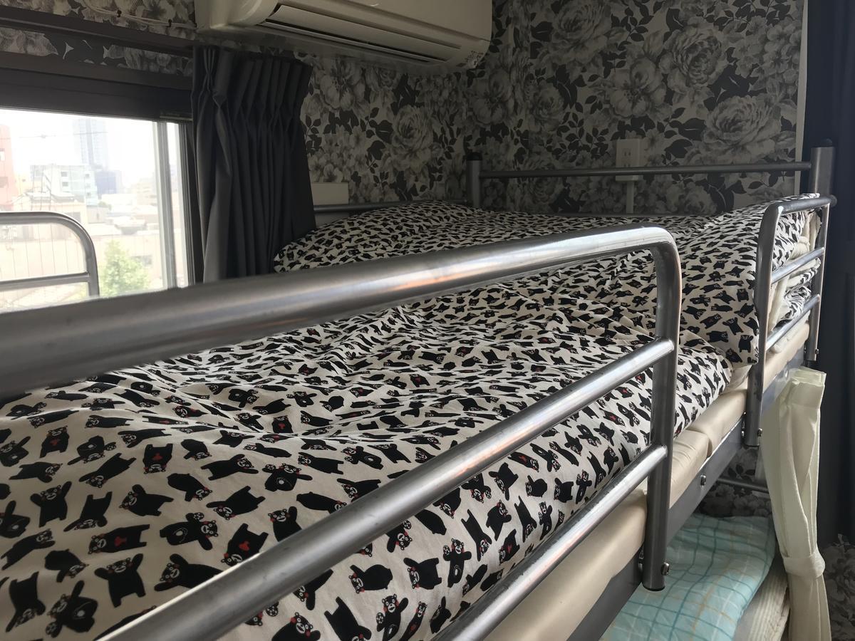 Guesthouse Tiga Kumamoto Bagian luar foto